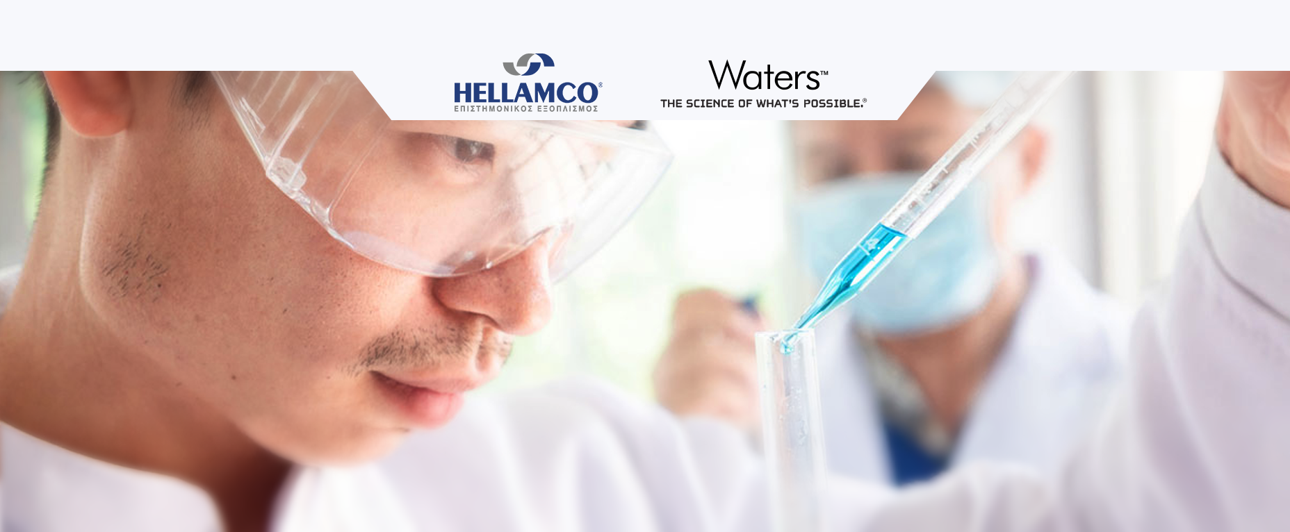 Close-up of scientist examining a test tube