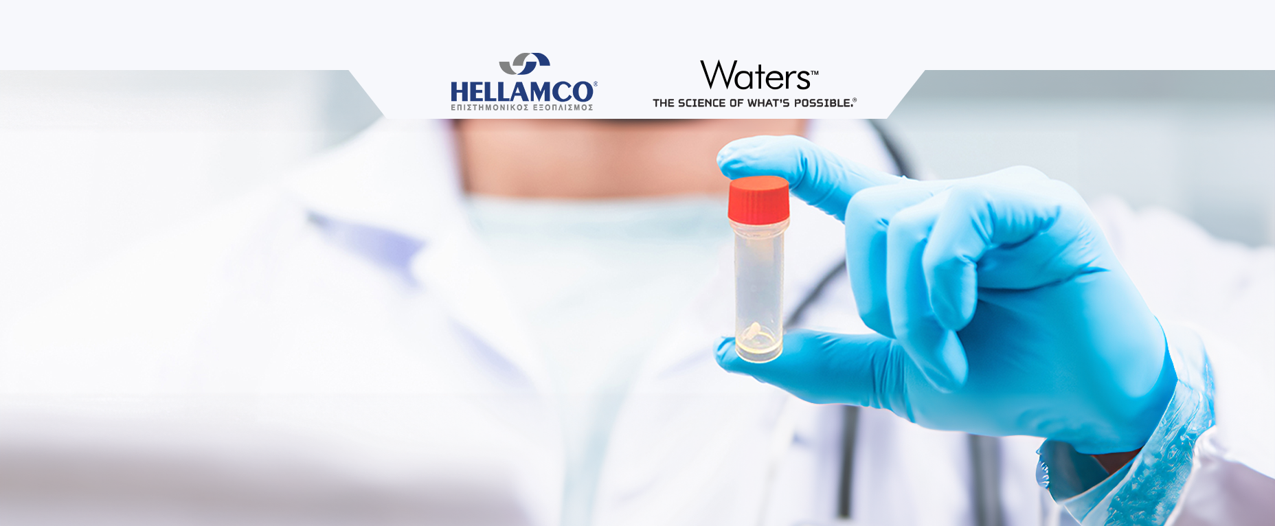 Scientist holding a vial